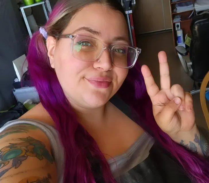 Mel, known as Purple, owner and master engraver at F² Engravables